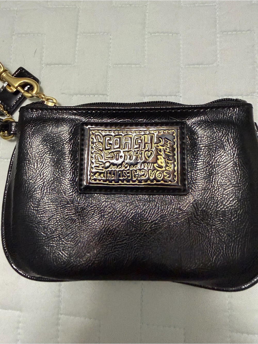 Coach Poppy Black Leather Wristlet with Gold Logo Plaque